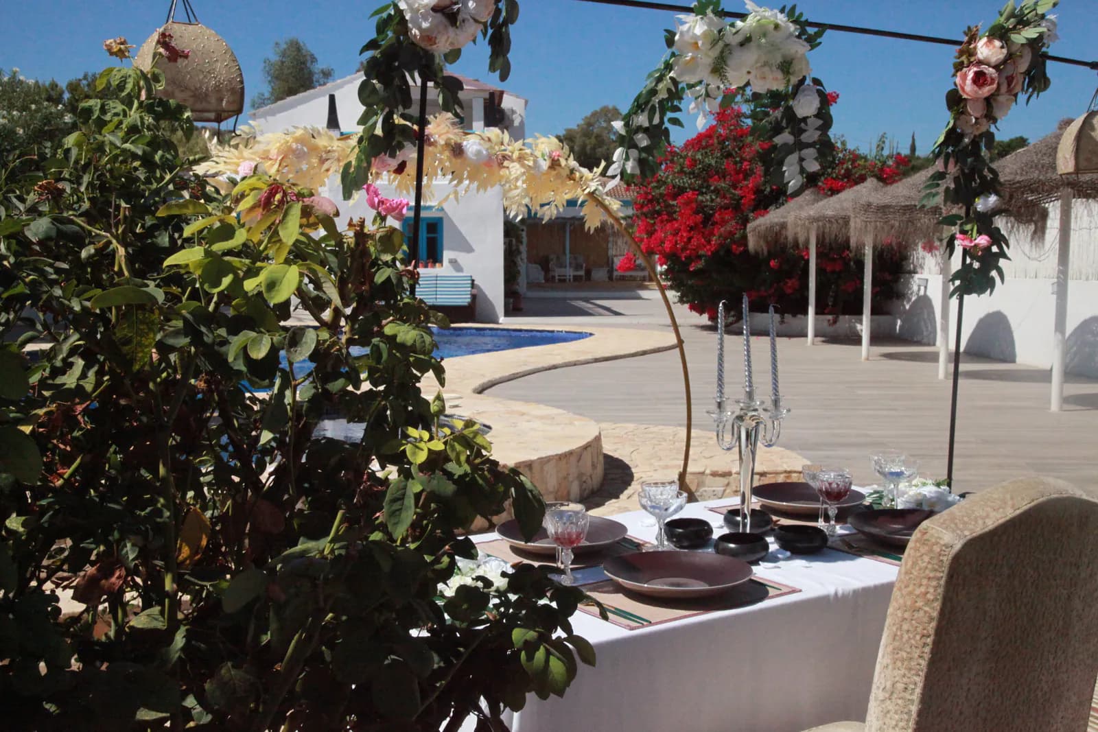 Outdoor dining beside the Dragonfly pool and gardens